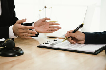 A professional lawyer discusses legal contracts with a client in an office, focusing on justice, finance, agreements, and courtroom guidance, offering expert advice, consultation, and business decisio
