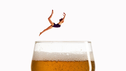Minimalist collage art. Diver mid-air above foamy beer glass with surreal energy. Concept of beverage marketing, nightlife advertising, travel lifestyle promotion, and creative branding.