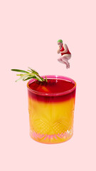 Colorful collage. Diver in red swimsuit jumping above vibrant cocktail with rosemary garnish....