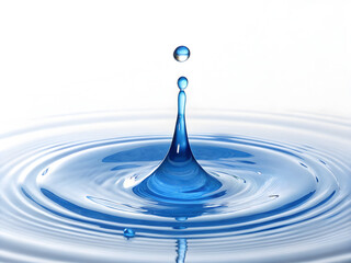 Blue liquid drop forming ripples on water surface image
