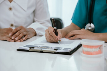 Our expert dentists consult with patients in a state-of-the-art clinic, using dental models and technology to provide effective oral care, treatment, diagnosis and health advice.