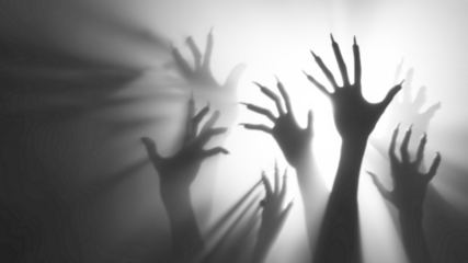 Shadow overlay effect for halloween background with Terrifying scary hands with long nails,Creepy monster claw,silhouette of hands,zombie hand rising out of a graveyard