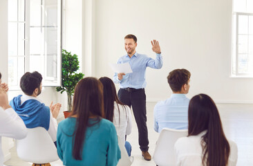 Boss conducting a meeting or conference for a team of business people and colleagues in an office....