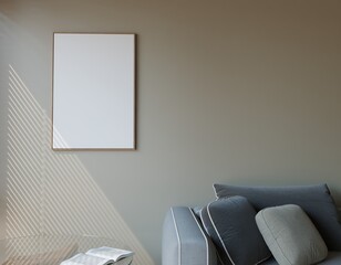 Empty framed canvas on neutral wall, beside a gray couch. Sunlight casts diagonal shadows
