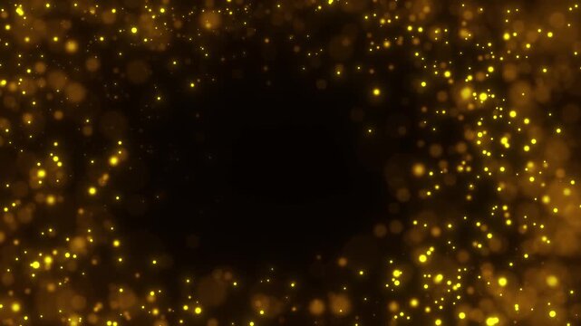 回転しながらカメラに飛んでくる金色の光のエフェクト動画