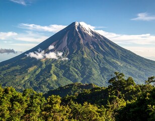 Fototapeta premium Volcanic peak rising above lush landscape