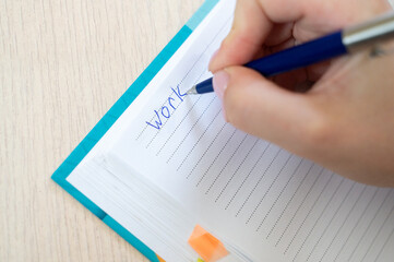 Organizing and structuring thoughts and ideas effectively in a notebook with a pen