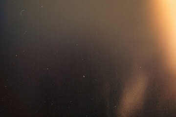 retro film overlay effect with scratch dust and light leaks,retro grain noisy film distressed texture light leak flare on black background