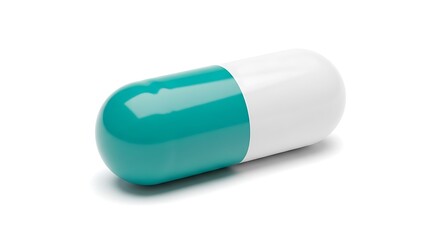 A single turquoise and white capsule lying on a white background