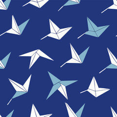 Charming seamless pattern featuring a repeating layout of colorful origami paper cranes