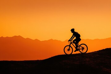Obraz premium Bike Marathon. Silhouette of Bicyclist Riding Mountain Bike on Sunset Hills Trail
