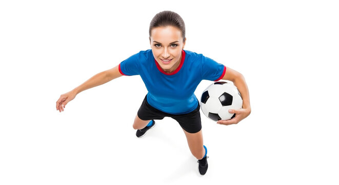 A female soccer player, viewed from above, holds a soccer ball, smiling. - Powered by Adobe