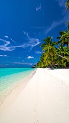Obraz premium Pristine beach, turquoise water, palm trees, and footprints in the sand under a vibrant blue sky