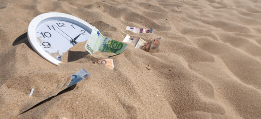 Clock and euro banknotes sinking in sand: time is money concept