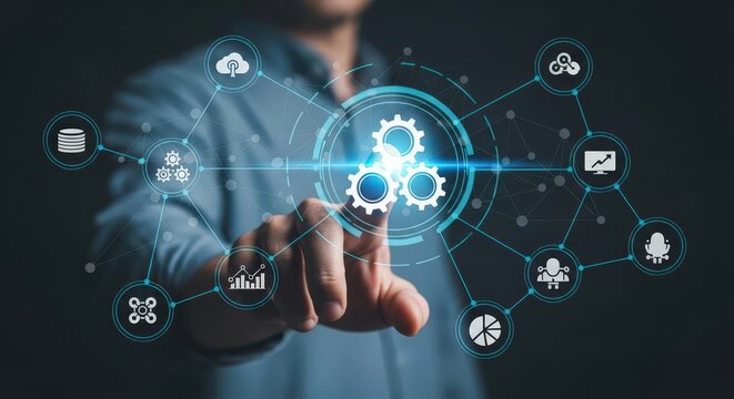 Businessman touching a digital interface with automation icons