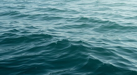 Obraz premium Teal Ocean Waves: Tranquil Water Texture Background
