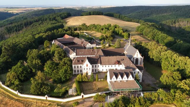 Reichenstein Monastery, Eifel landscape, Monschau, Germany. Sunset view. Historic monument.