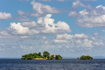 Small tropical islands with houses in the Caribbean Sea