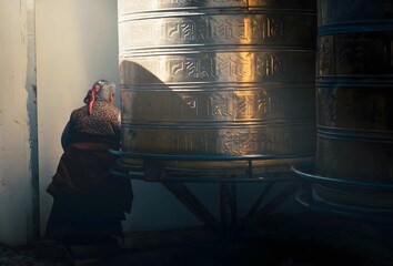 Traditional Prayer Wheels Yunnan Province China Buddhist Temple Spiritual Worship Golden Hour...