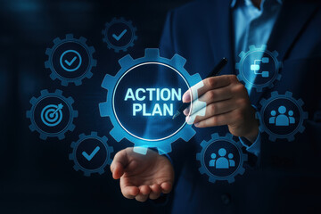 Action plan concept with business person holding pen and digital gear icons in dark background