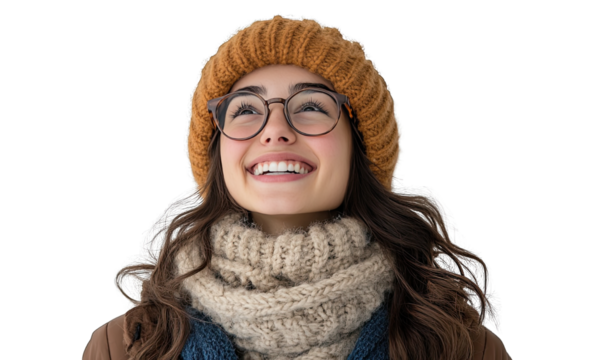 A woman with glasses and a knit hat is smiling
