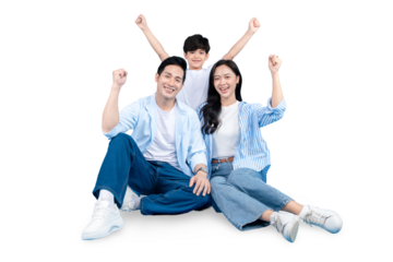 A family of three celebrates a moment of happiness together. The child is standing with arms raised while his parents are sitting and smiling on PNG 