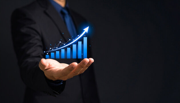 Businessman holding rising bar chart with glowing arrows. Concept for business growth, financial success, profit increase, investment strategy, stock market and data analytics