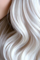 Naklejka premium Luxurious platinum blonde wavy hair texture closeup showing smooth, silky strands with gentle curves and natural shine against neutral background.