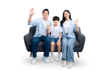Happy family of three waving and smiling on a sofa on PNG 