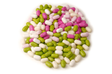 Sweet multicolored candies isolated on white background.