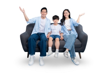 A cheerful family of three sitting together on a sofa, welcoming with hands up PNG 