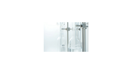 Sterile laboratory glassware setup with a transparent chemical flask held by a clamp on a retort stand against a bright white background for scientific research.