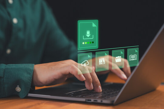 Person typing on laptop with icons of file download, cloud upload, folders and documents. Concept of cloud storage, data transfer, digital file management, online storage and information technology.