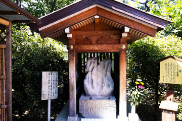 Ancient holy stone in antique shrine for japanese people traveler travel visit and rite merit respect pray blessing worship of angel deity in Sensoji temple at Asakusa on July 21, 2025 in Tokyo, Japan