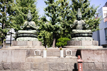 Obraz premium Ancient Quan Yin angel deity or Kuan Yin mercy goddess in antique shrine shinto for japanese people travelers travel visit respect praying blessing worship at Asakusa on July 21, 2025 in Tokyo, Japan