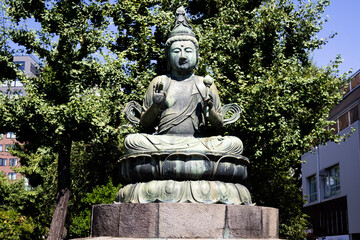 Ancient Quan Yin angel deity or Kuan Yin mercy goddess in antique shrine shinto of Sensoji temple for japanese people travelers travel visit respect praying blessing worship at Asakusa in Tokyo, Japan