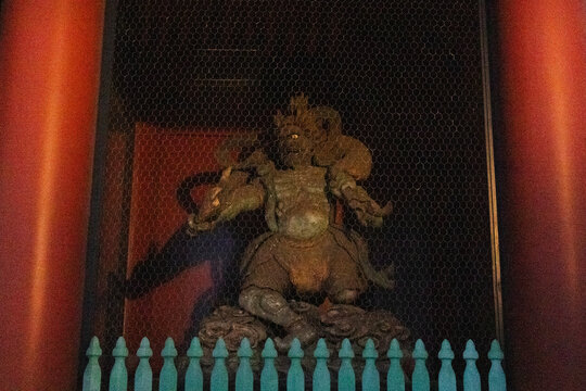 Agyo Raijin god master of thunder and Ungyo Fujin deities of wind at antique Kaminarimon Gate of ancient Senso-ji Temple for local japanese people traveler travel visit at Asakusa city in Tokyo, Japan