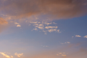 The amazing color of the evening sky and the pattern of clouds on it.