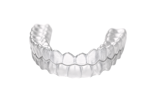 Clear dental aligner tray with individual tooth compartments for orthodontic treatment application, isolated on a transparent background