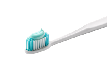 White toothbrush with blue and white bristles and mint green toothpaste dollop, isolated on a transparent background