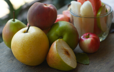 Various autumn fruits are placed under the window.