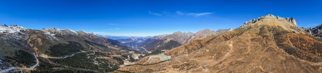 The mountain landscape of Baima Snow Mountain Pass in Yunnan Province	