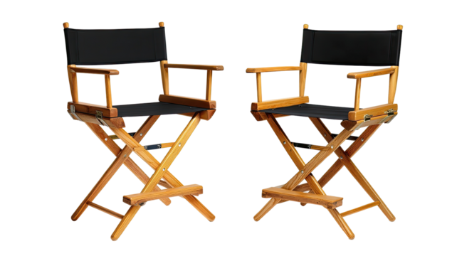 Two black canvas director's chairs on a dark background.  Each chair has a wooden frame,  a black canvas seat and back, and armrests.  The chairs are identical and arranged side-by-side