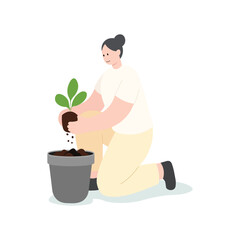 Woman Planting a Seedling