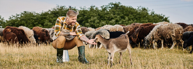 Modern farmer nurturing bond with a young goat in the serene countryside