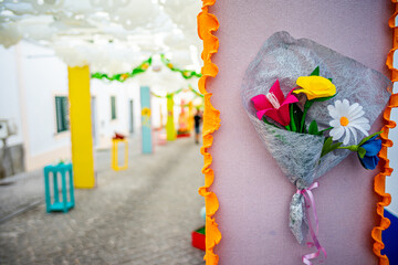Paper flower in the decorated streets and visitors at the paper flower festival organized by the town of Redondo-&Eacute;vora-Portugal