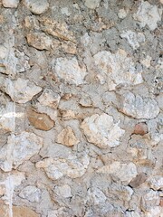 Beautiful background from a part of a residential building wall made of stone