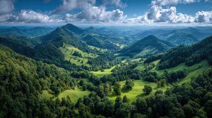Obraz premium Lush Green Rolling Hills and Valleys of a Mountainous Landscape