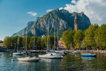 Sailboats docked on Lake Como in Lecco, Italy