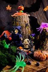skull, black hand, spiders and other characters gathered to celebrate All Saints Day in the witch's...